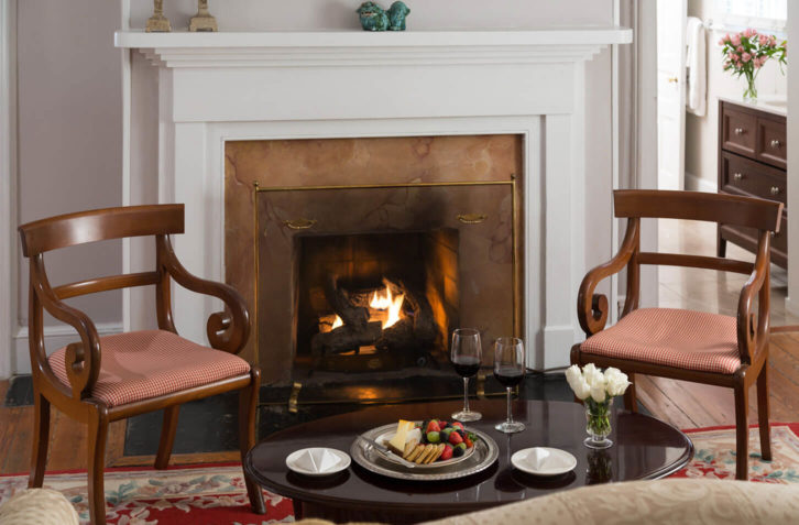 A cozy gas fireplace adds to the romantic ambiance